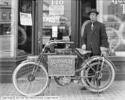 Man posing with his new Flying Merkel, in front of Salt Lake City Tire Depot in 1912.  From the Digital Collections of the Utah State History,  visit http://history.utah.gov/ research_and_collections/photos/ index.html